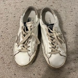 Golden Gooses. Squeak a little when walking.